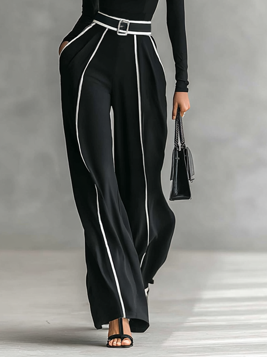 Two-piece women's set with high-neck long-sleeve top, wide-leg pants, and belt