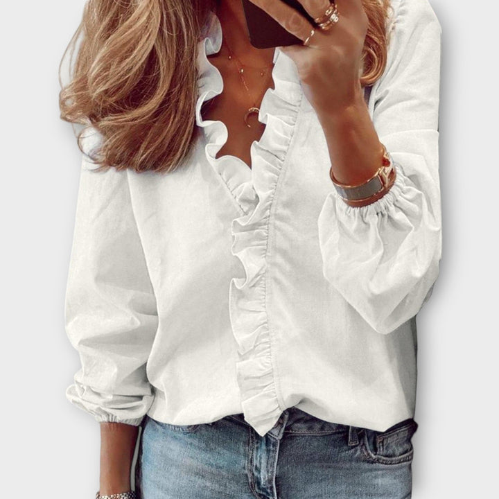 Women's Long Sleeve Relaxed Fit Ruffle Trim V Neck Blouse with Gathered Elastic Cuffs and Unprinted Solid Body