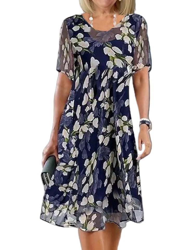 omen's Short Sleeve Round Neck Sheer Overlay Floral Print A-Line Midi Dress with Layered Hem