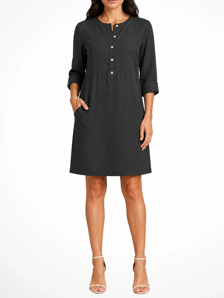 Women's Solid Relaxed Shirt Dress with Partial Button Henley Neckline Roll Tab Three Quarter Sleeves and Front Patch Pockets