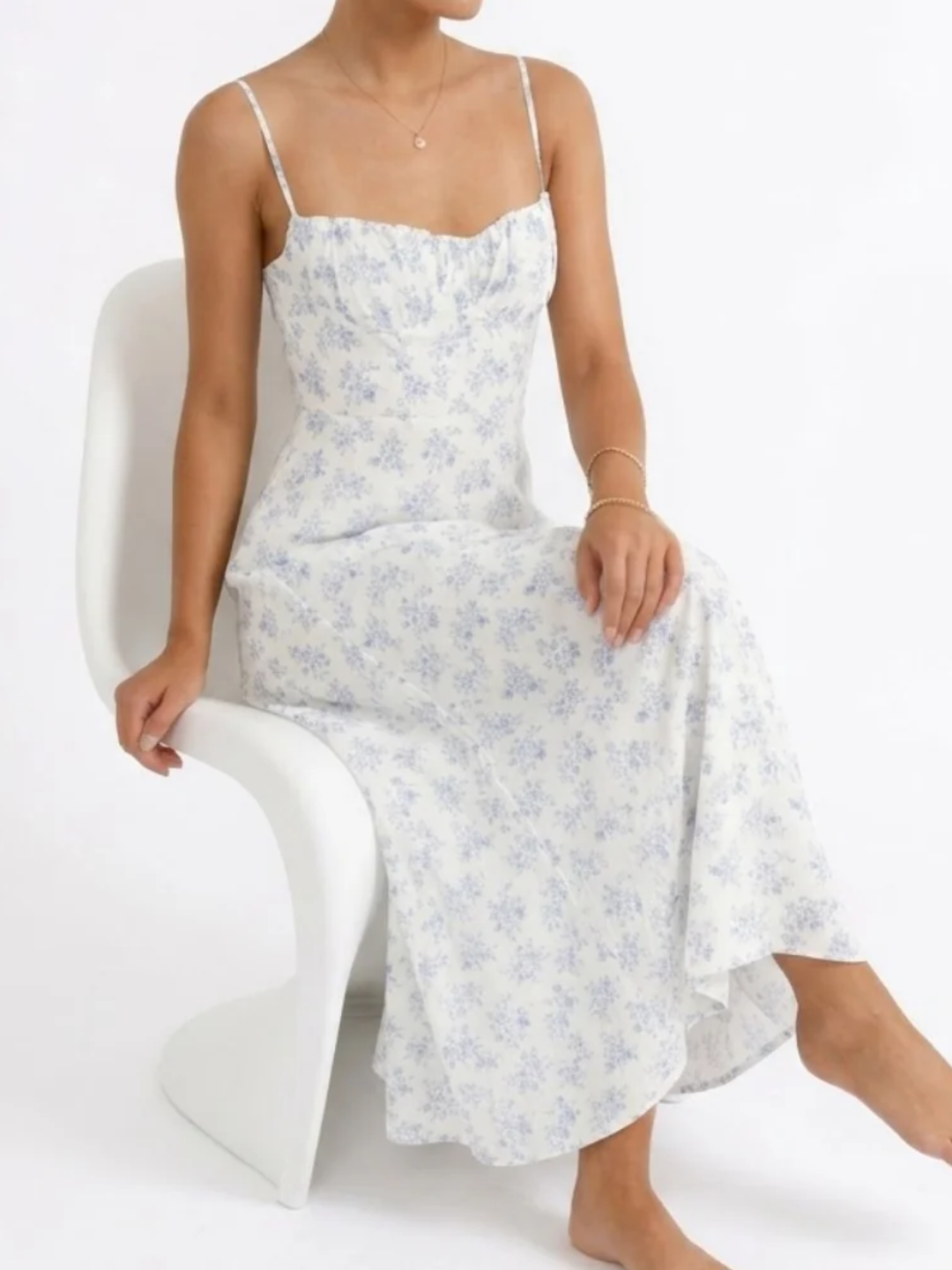Women's Spaghetti Strap Gathered Sweetheart Bustier Neckline Fitted Bodice All Over Ditsy Floral Print Fluid A-Line Midi Dress